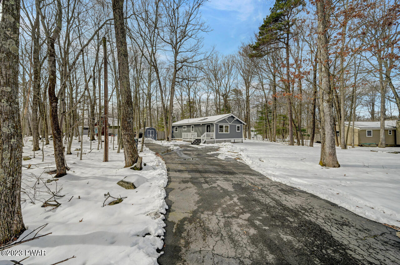 119 Hemlock Road Milford, PA 18337 - Photo 2 of 42 a view of road with trees