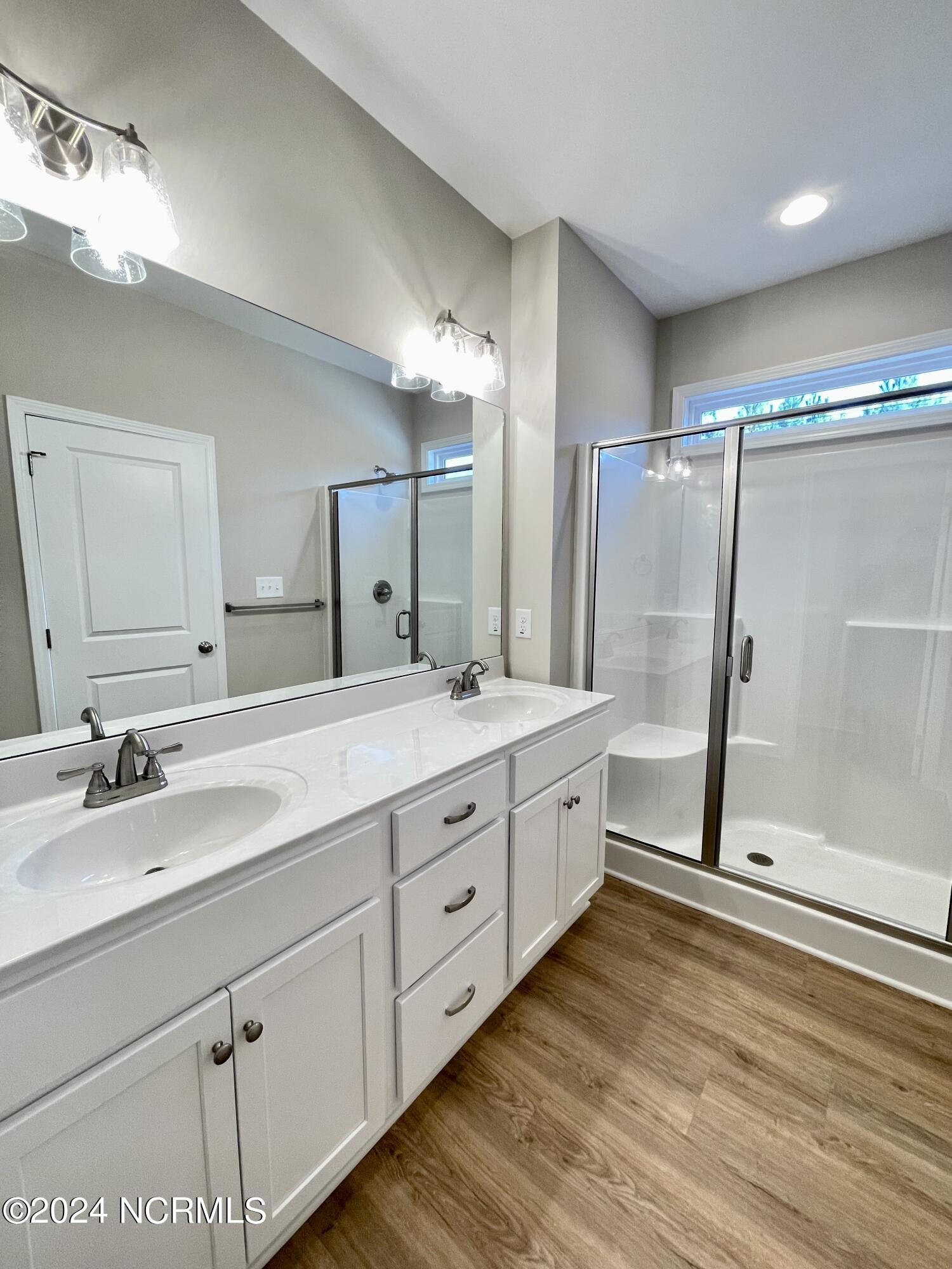 85 Morningdew Way Spring Hope, NC 27882 - Photo 17 of 21 Owners suite bathroom with private water closet.
