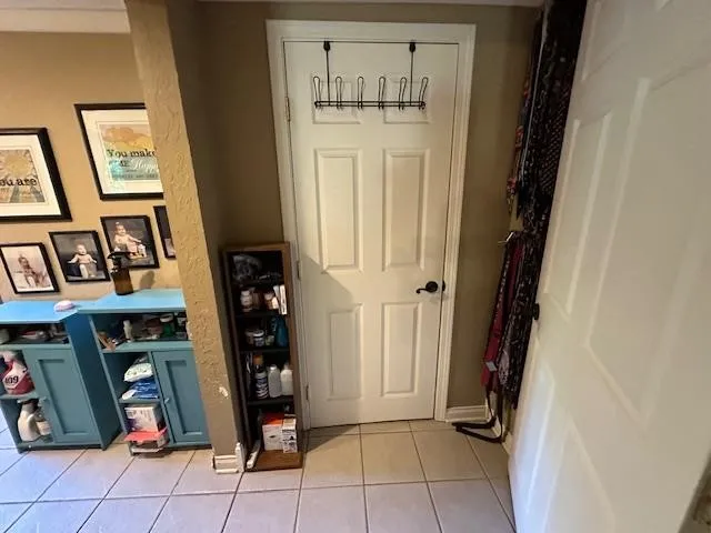 a bathroom with a sink toilet and window