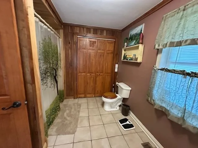 a kitchen with stainless steel appliances a counter space a sink and cabinets