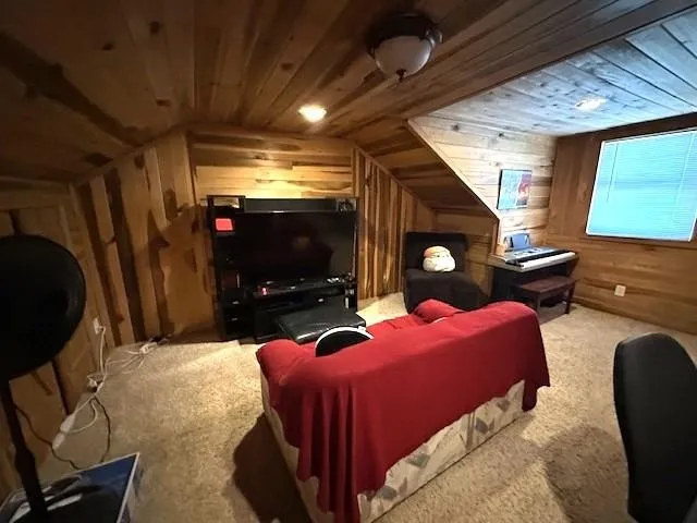 a children room with furniture and a window