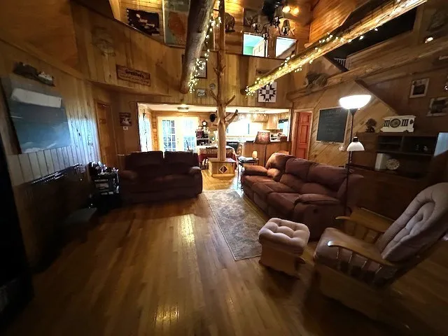 a view of a livingroom with furniture and a fireplace