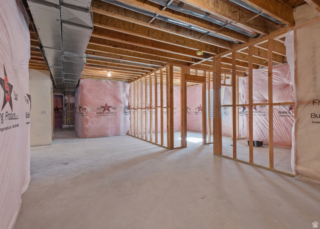 11214 South Easy Bee Road, Unit 270 South Jordan, UT 84009 - Photo 30 of 31 Unfinished basement with concrete flooring, exposed wood framing, and overhead ductwork