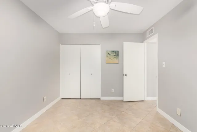 a bathroom with a double vanity sink mirror and