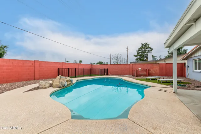 a view of a house with a swimming pool