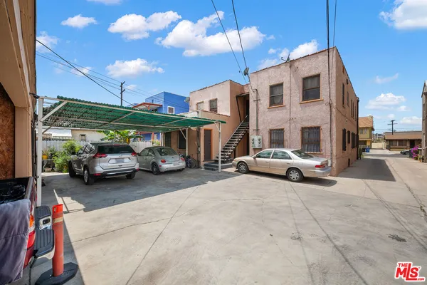 a view of a cars parked in front of a building