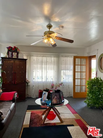 a view of livingroom with furniture and window