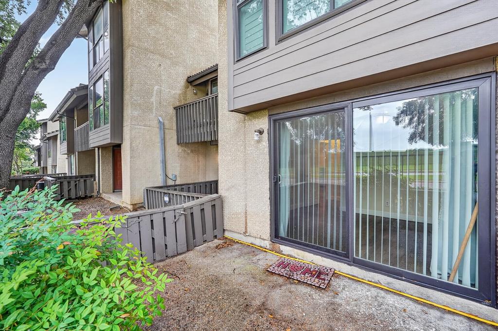 4549 North O'Connor Road, Unit 1262 Irving, TX 75062 - Photo 20 of 21 a front view of a house with a garden
