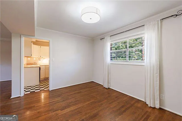 a kitchen with a stove and a cabinets