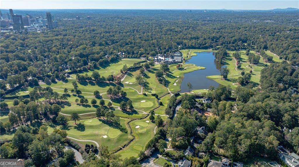 3660 Peachtree Road Northeast, Unit 2H Atlanta, GA 30319 - Photo 49 of 56 an aerial view of a house with a lake view
