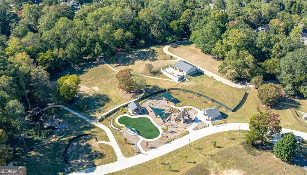 3660 Peachtree Road Northeast, Unit 2H Atlanta, GA 30319 - Photo 53 of 56 an aerial view of a house with a swimming pool