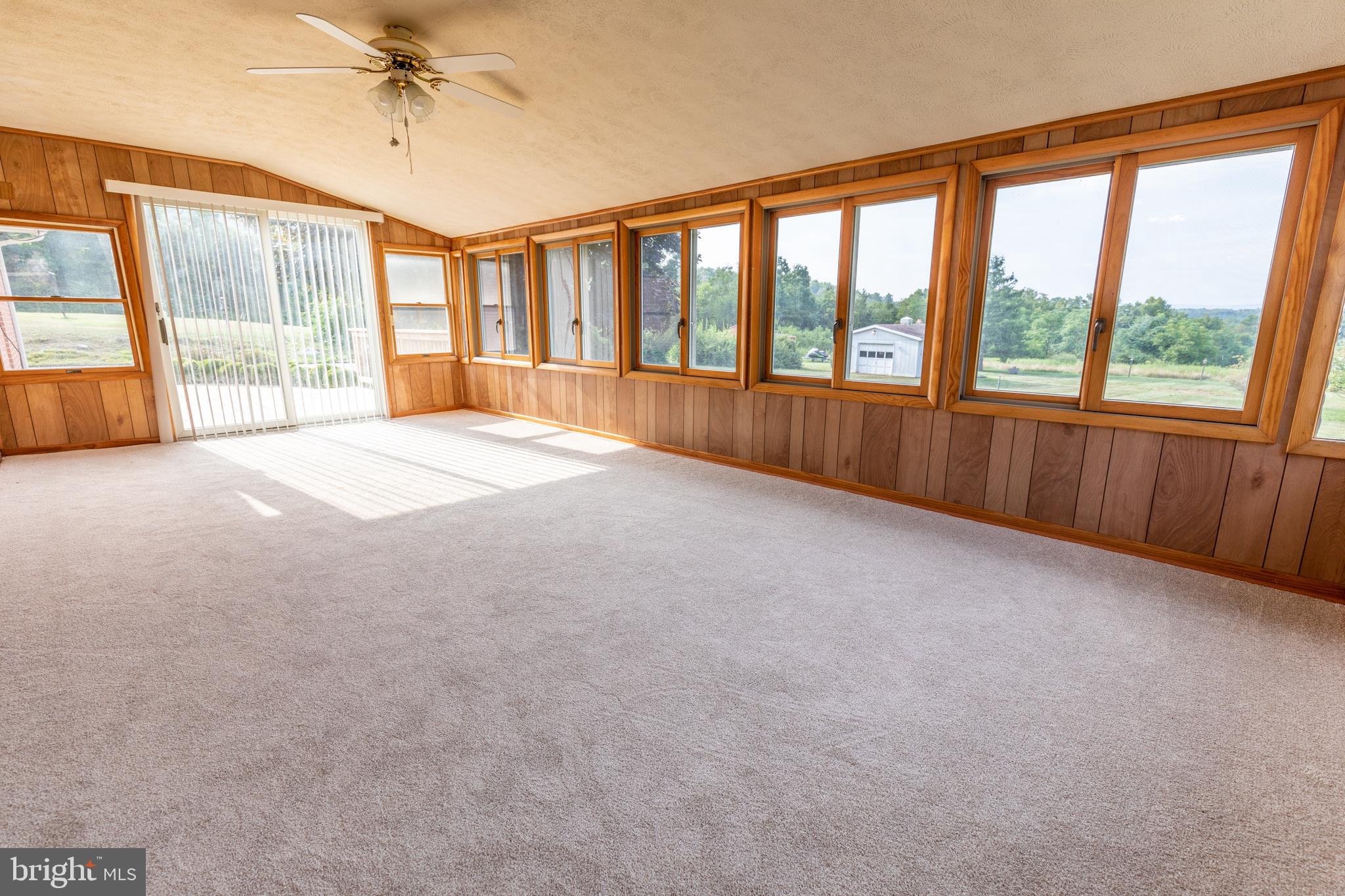 175 Camp Frame Road Hedgesville, WV 25427 - Photo 17 of 57 Huge sunroom off of the dining room is a great