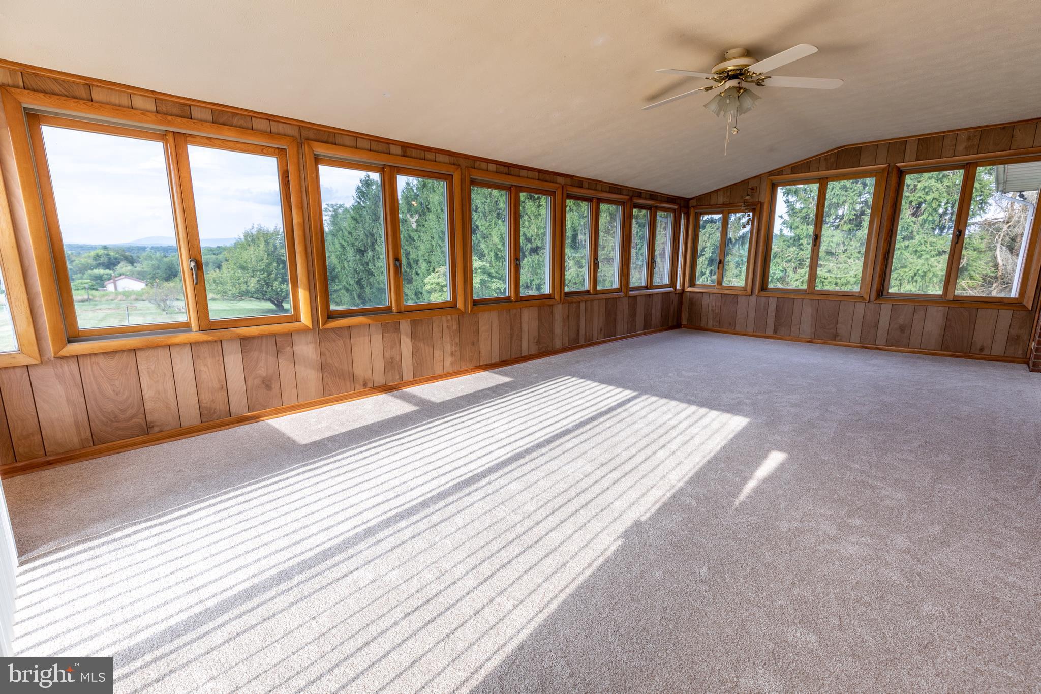 175 Camp Frame Road Hedgesville, WV 25427 - Photo 18 of 57 place to gather-Large windows surround it entirely