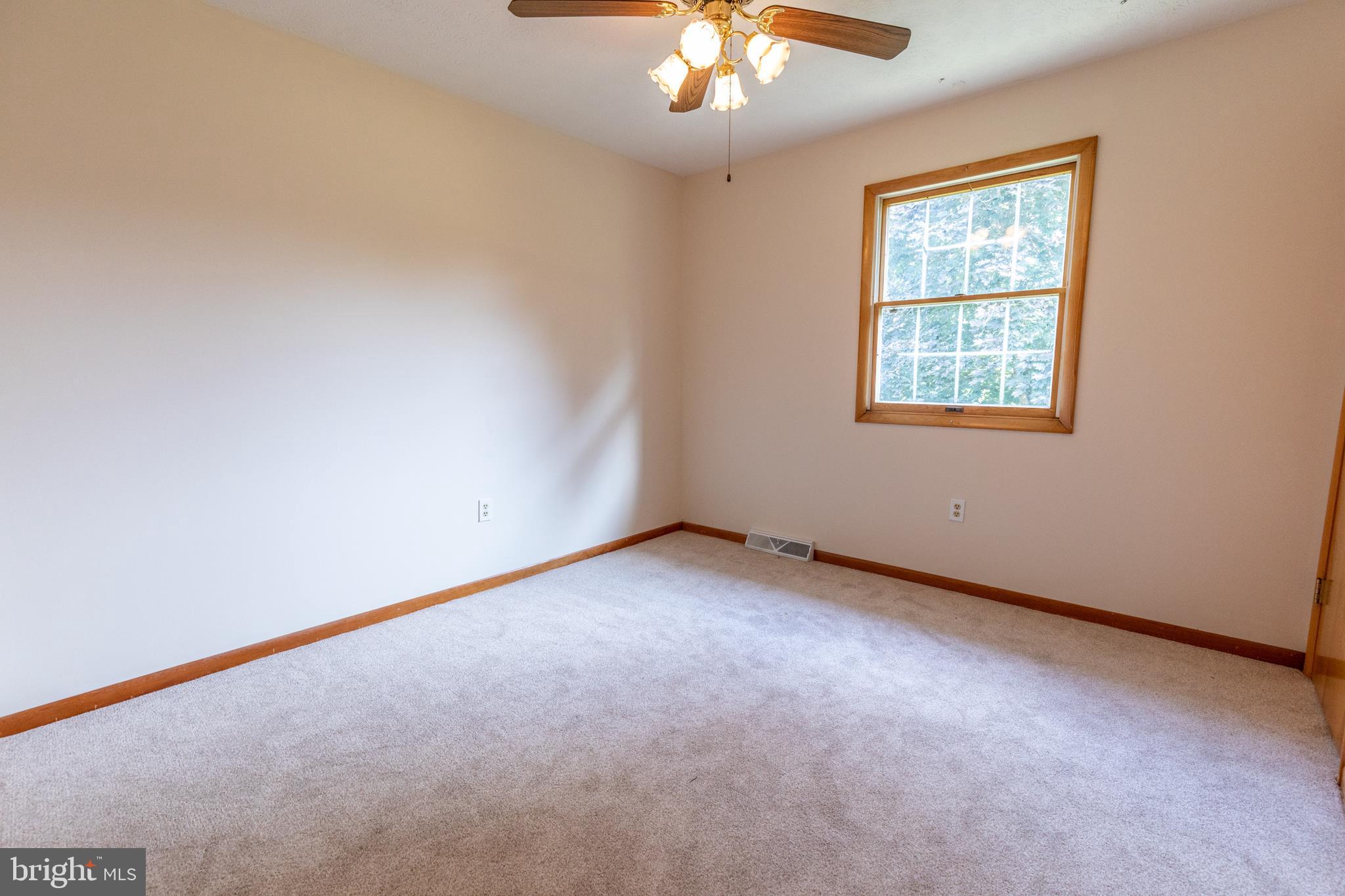 175 Camp Frame Road Hedgesville, WV 25427 - Photo 20 of 57 Bedroom 1 has neutral paint and carpeting