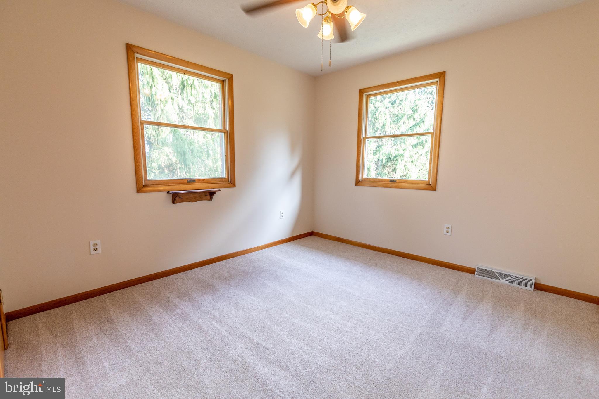 175 Camp Frame Road Hedgesville, WV 25427 - Photo 25 of 57 Bedroom 2 features neutral paint and carpet