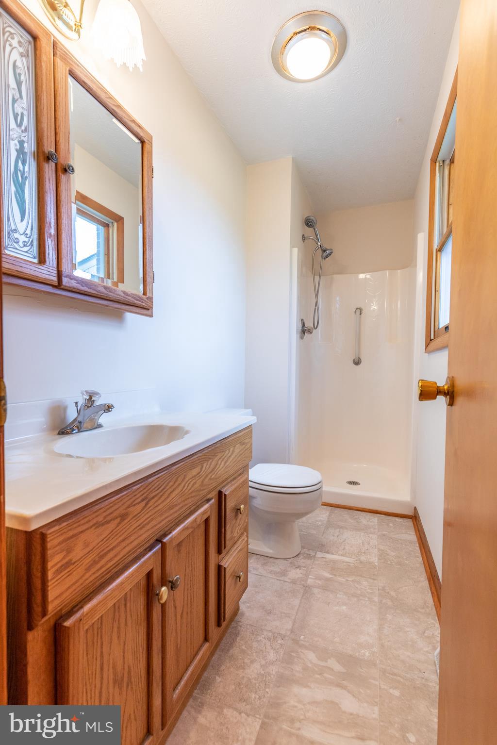 175 Camp Frame Road Hedgesville, WV 25427 - Photo 33 of 57 Master bath w/ vinyl floor and walk-in shower