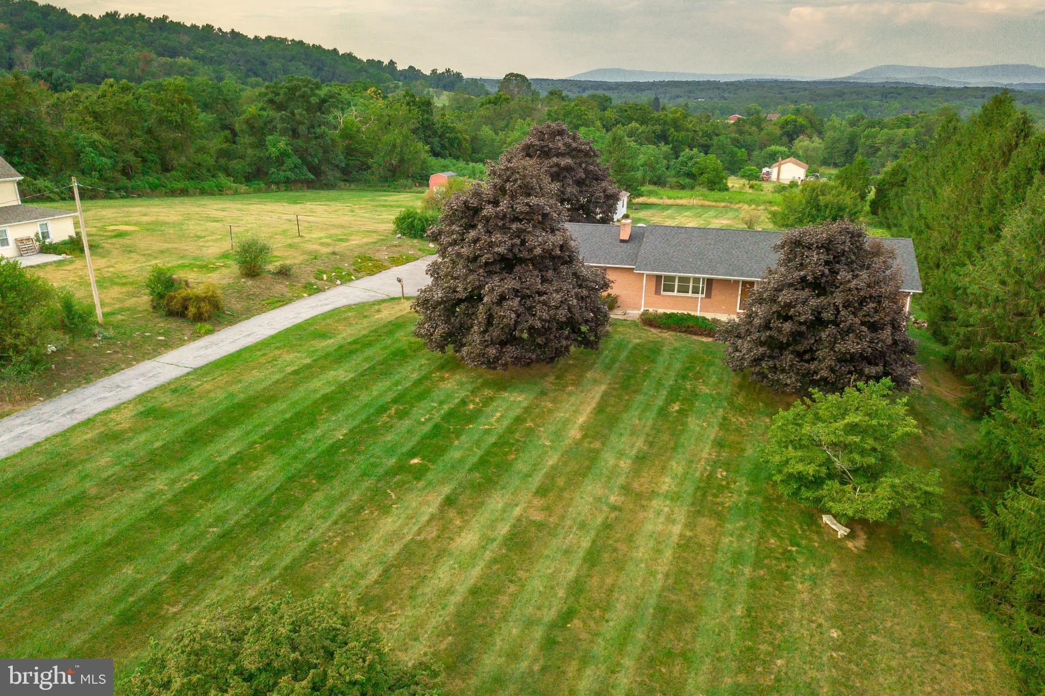 175 Camp Frame Road Hedgesville, WV 25427 - Photo 51 of 57 Mature trees in the yard add some priacy