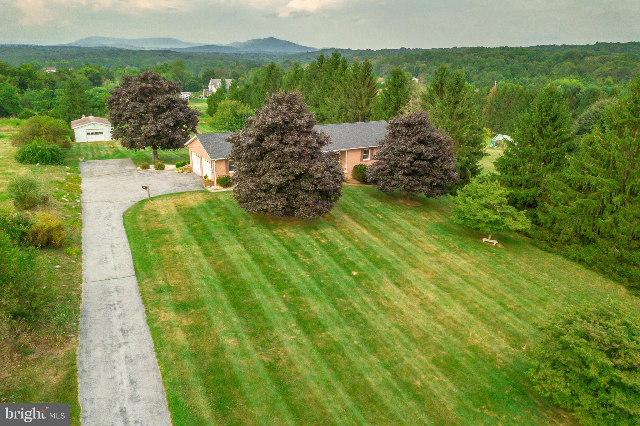 175 Camp Frame Road Hedgesville, WV 25427 - Photo 52 of 57 Long level driveway leads to the attached garage