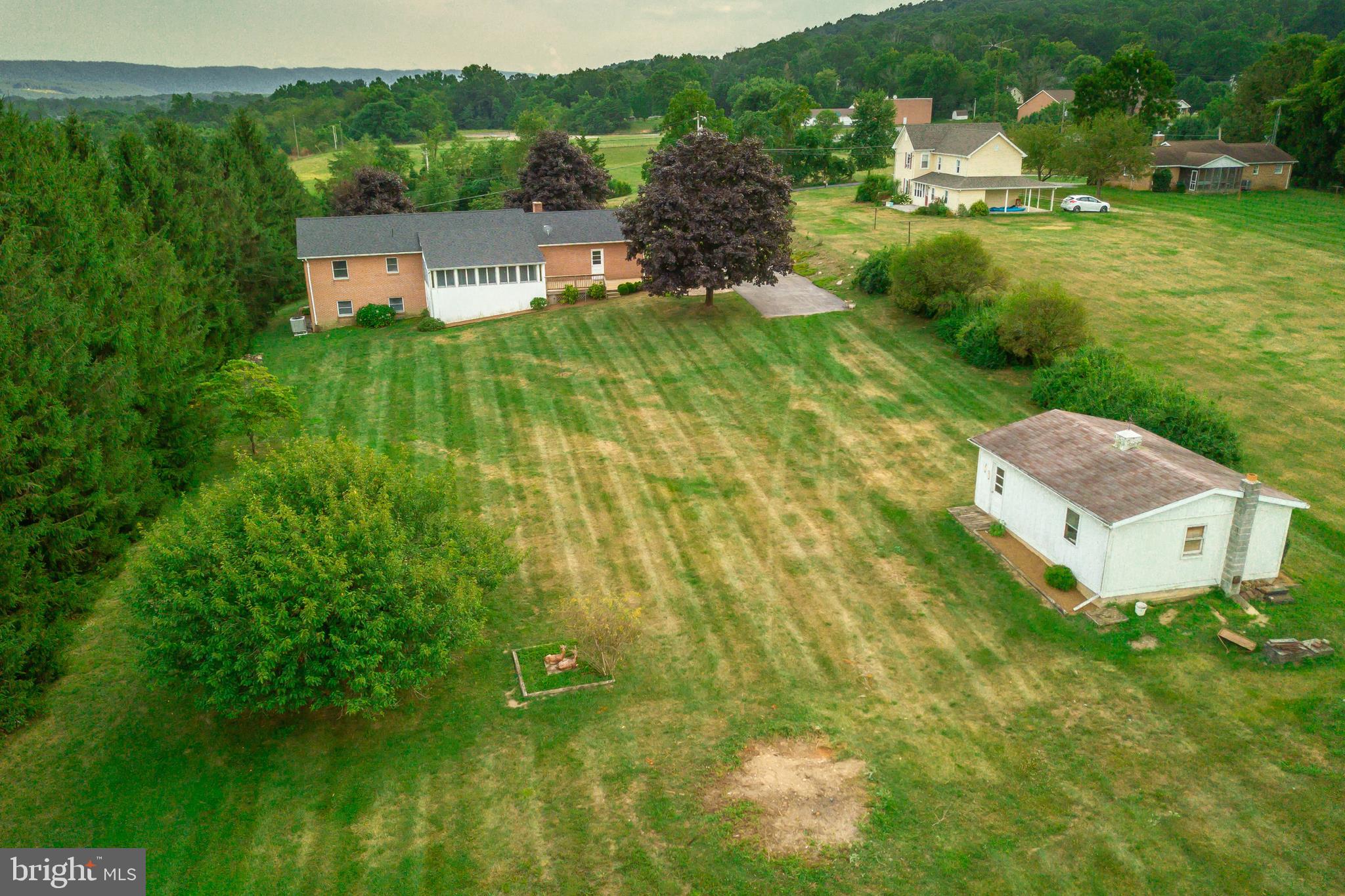 175 Camp Frame Road Hedgesville, WV 25427 - Photo 53 of 57 Across the yard is a detached single car garage