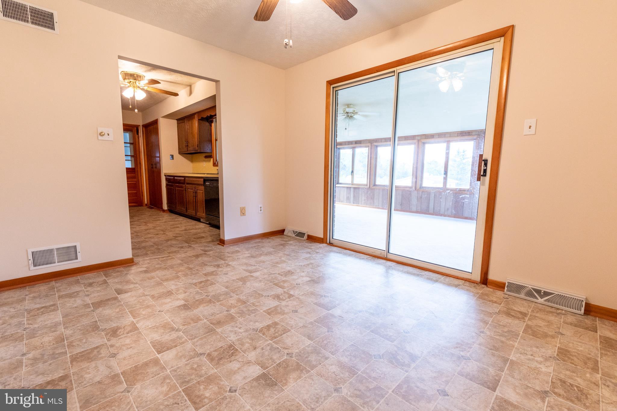 175 Camp Frame Road Hedgesville, WV 25427 - Photo 8 of 57 Dining room measures 9ft11inx11ft11in w/ vinyl