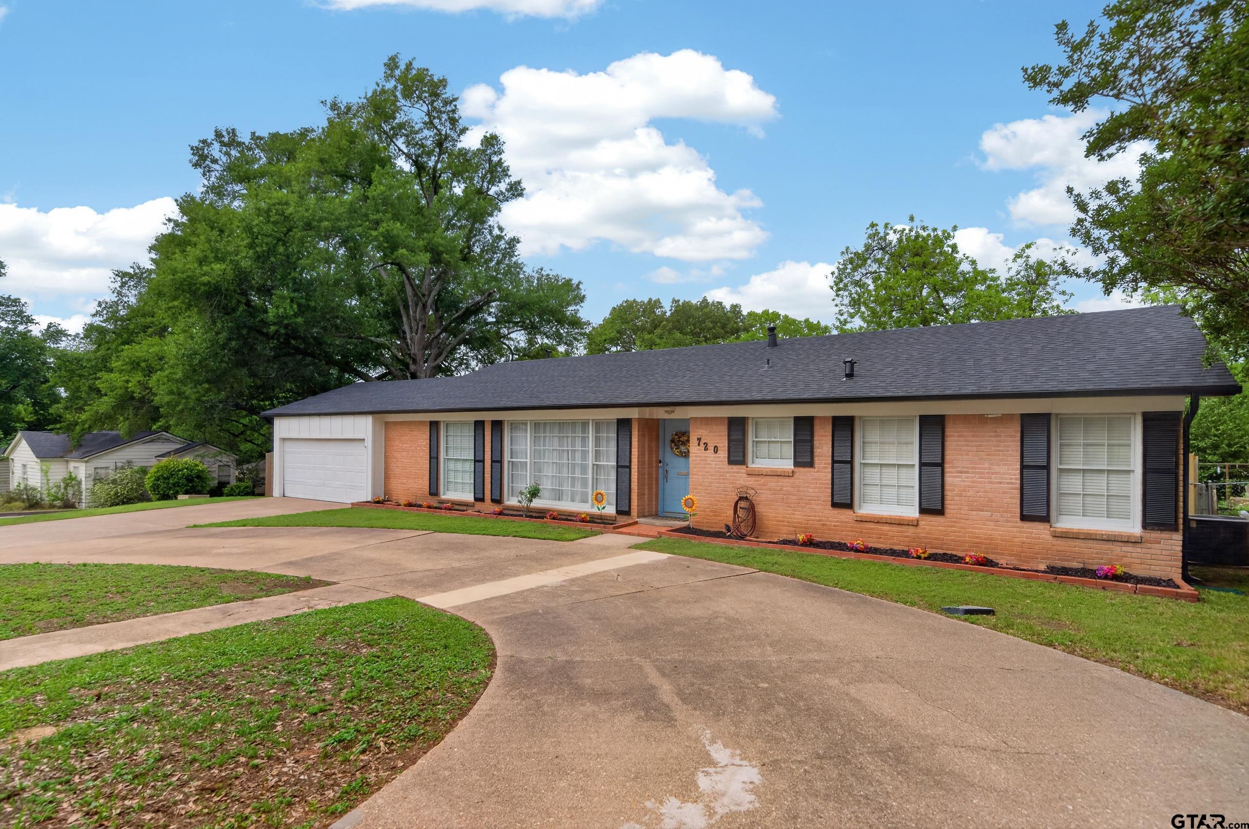720 Wilma Street Tyler, TX 75701 - Photo 3 of 41 front view of a house with a yard