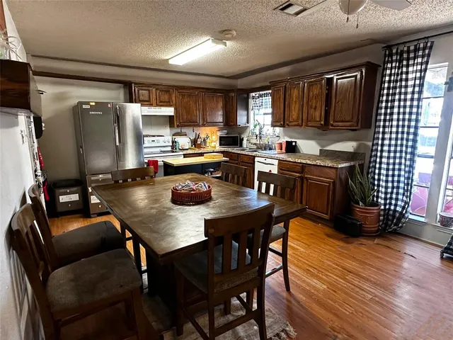a view of a dining room with furniture