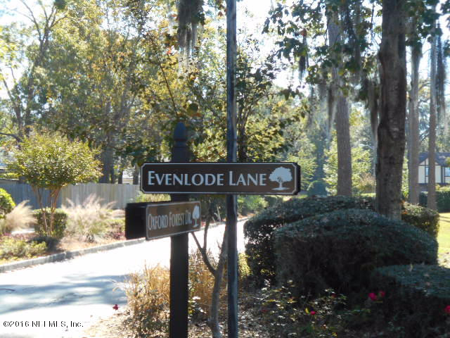4810 Evenlode Lane Jacksonville, FL 32217 - Photo 3 of 21 a street sign on a sidewalk next to a road