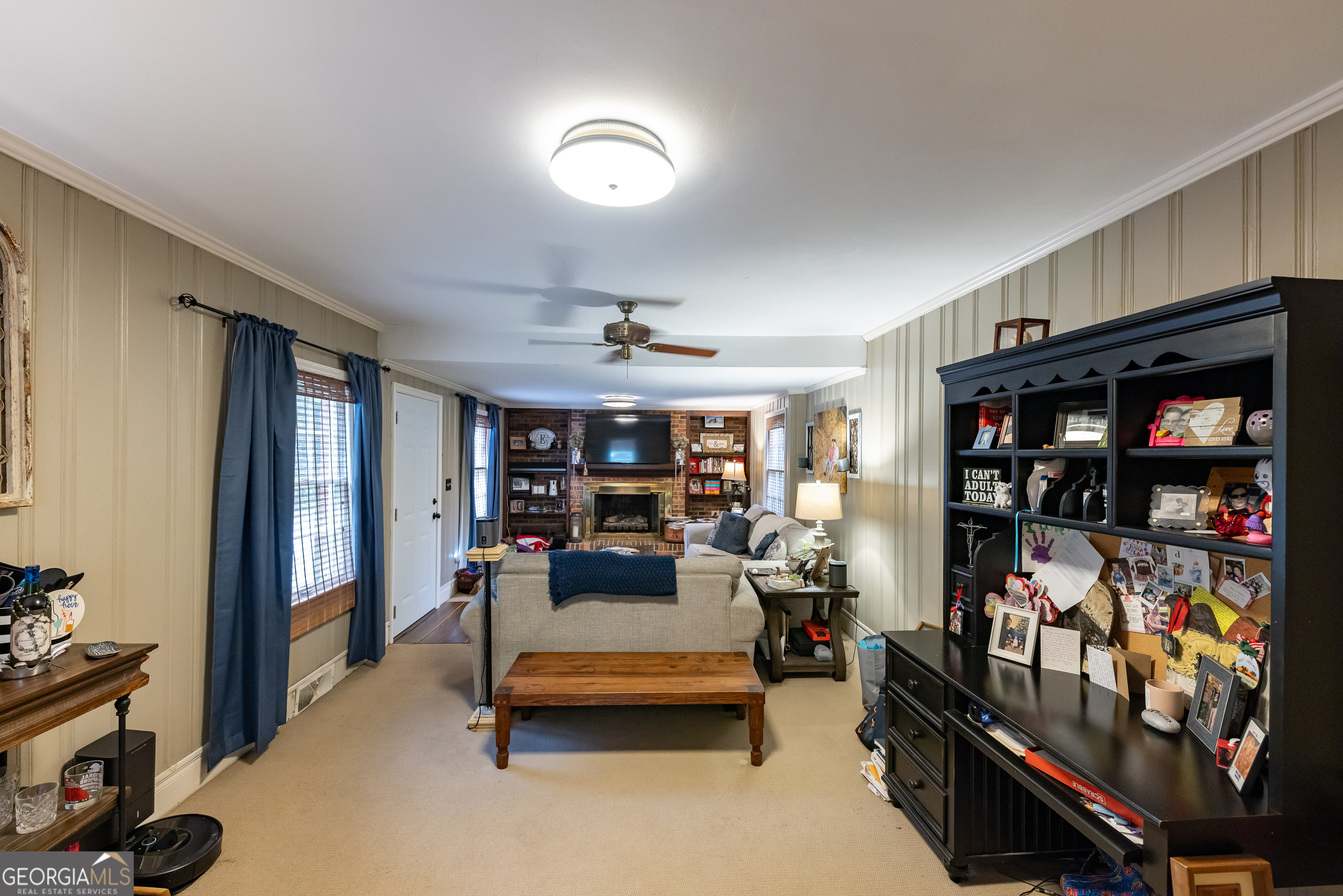 314 Cherokee Road Thomaston, GA 30286 - Photo 15 of 46 a living room with furniture and a flat screen tv