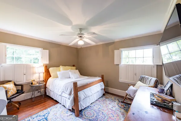 a bed room with a bed and a couch