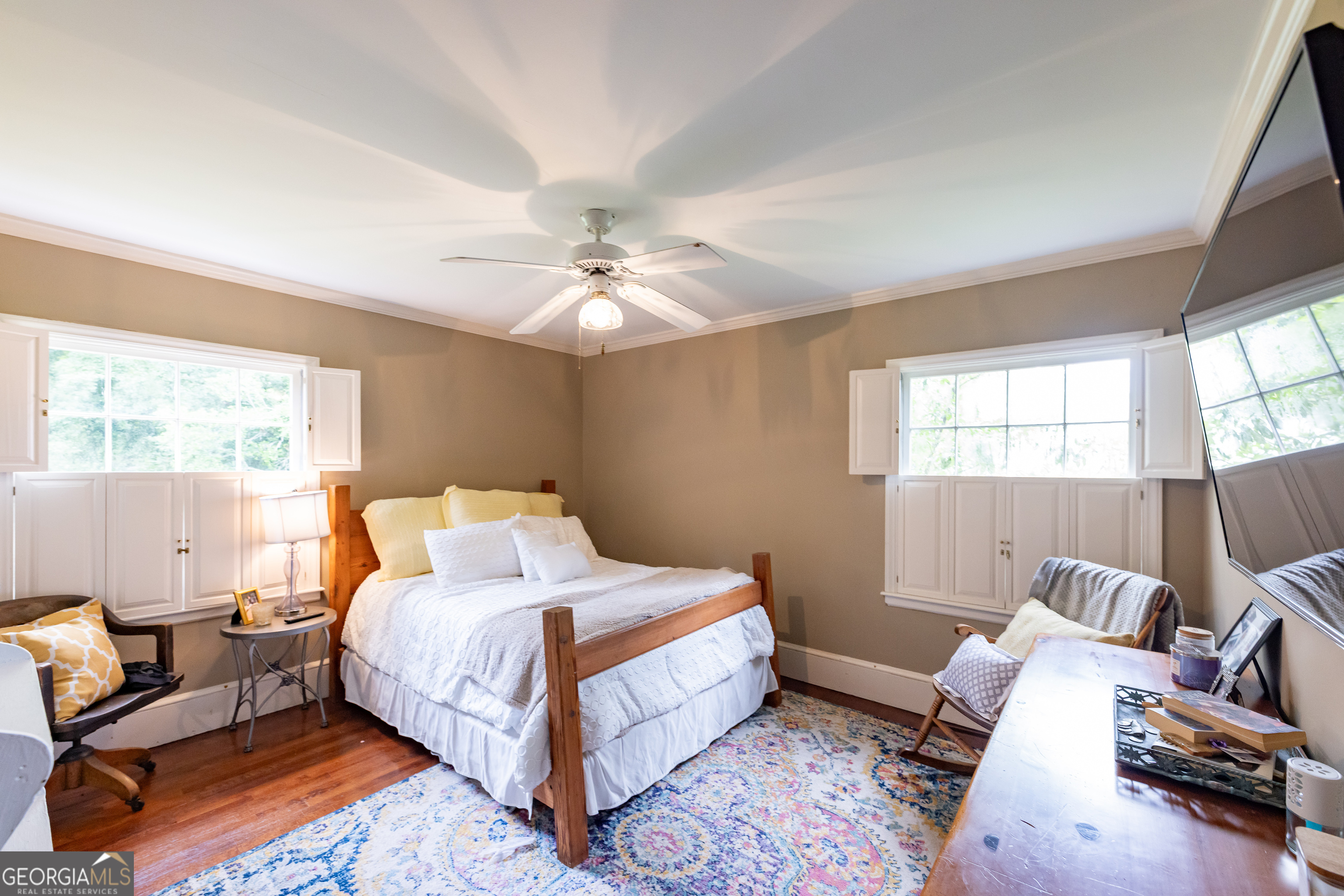 314 Cherokee Road Thomaston, GA 30286 - Photo 17 of 46 a bed room with a bed and a couch