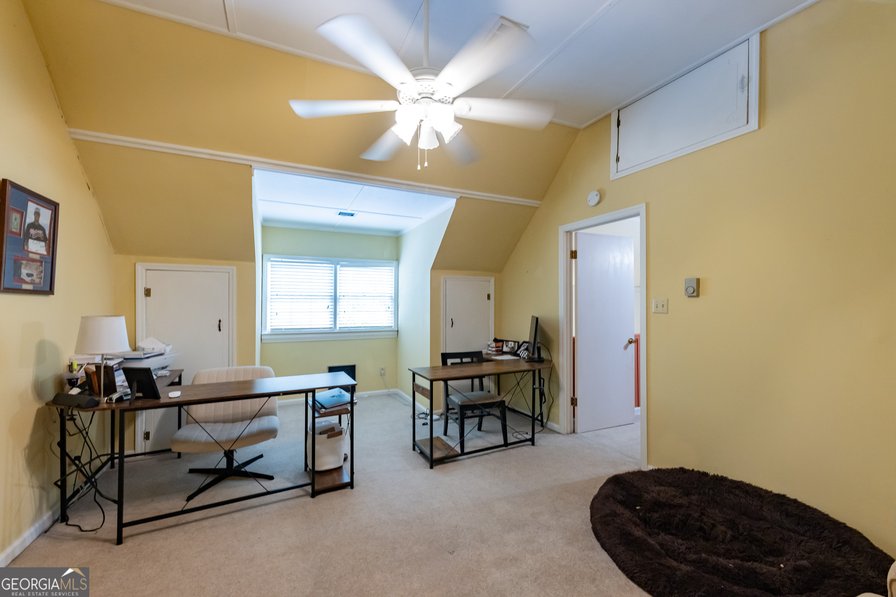 314 Cherokee Road Thomaston, GA 30286 - Photo 27 of 46 a living room with furniture and a chandelier