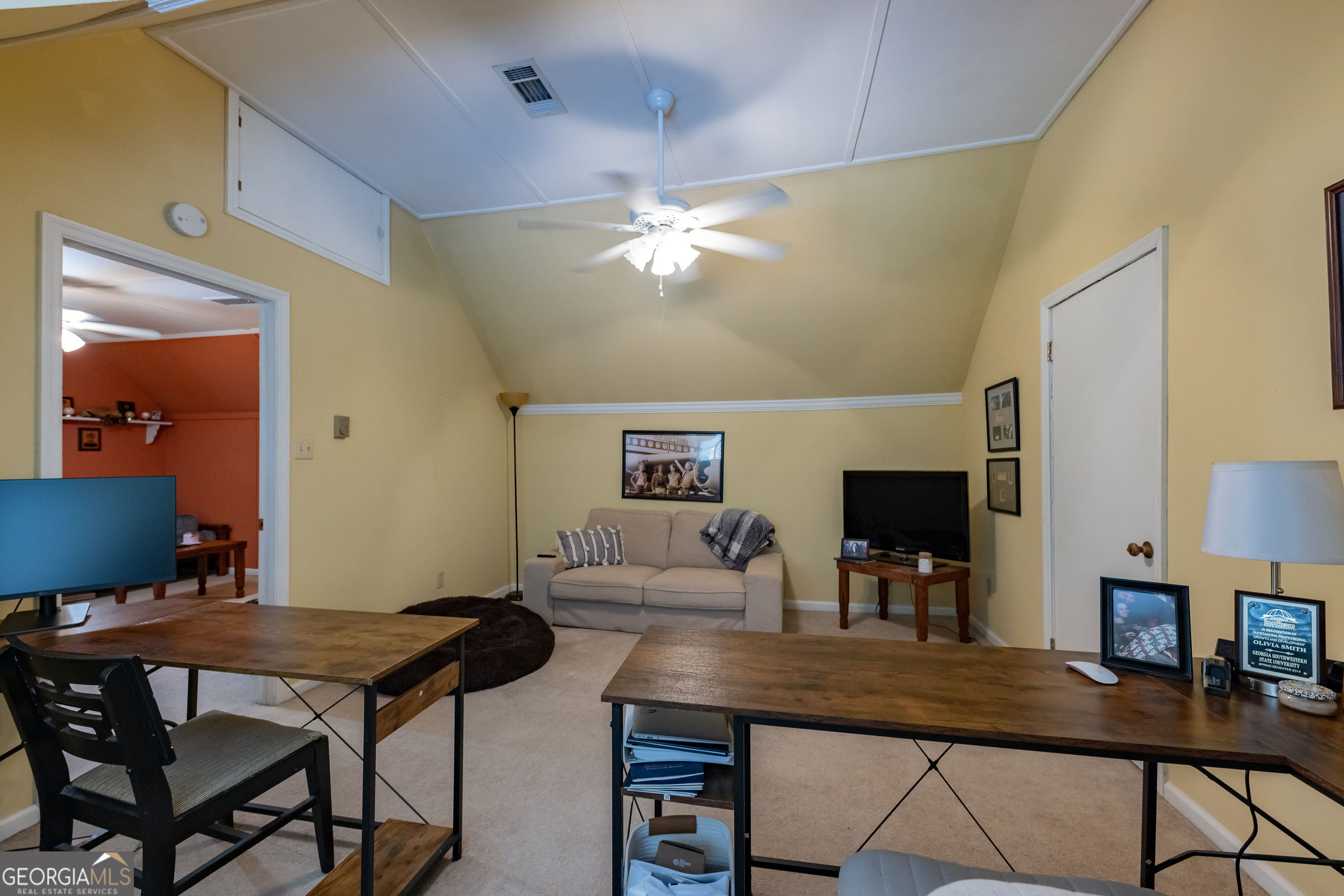 314 Cherokee Road Thomaston, GA 30286 - Photo 28 of 46 a view of a dining room with furniture and a chandelier