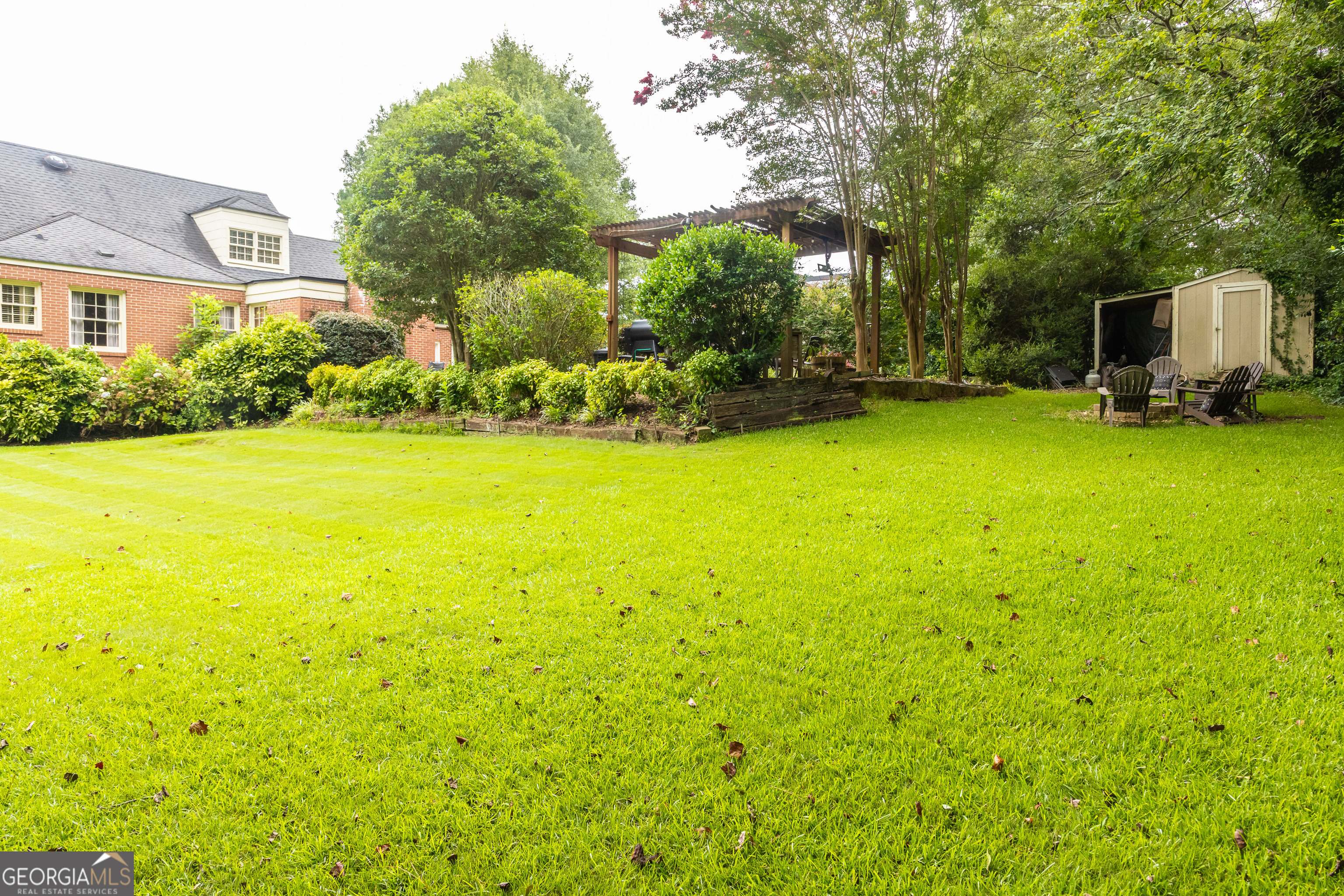 314 Cherokee Road Thomaston, GA 30286 - Photo 36 of 46 a view of a garden with a house