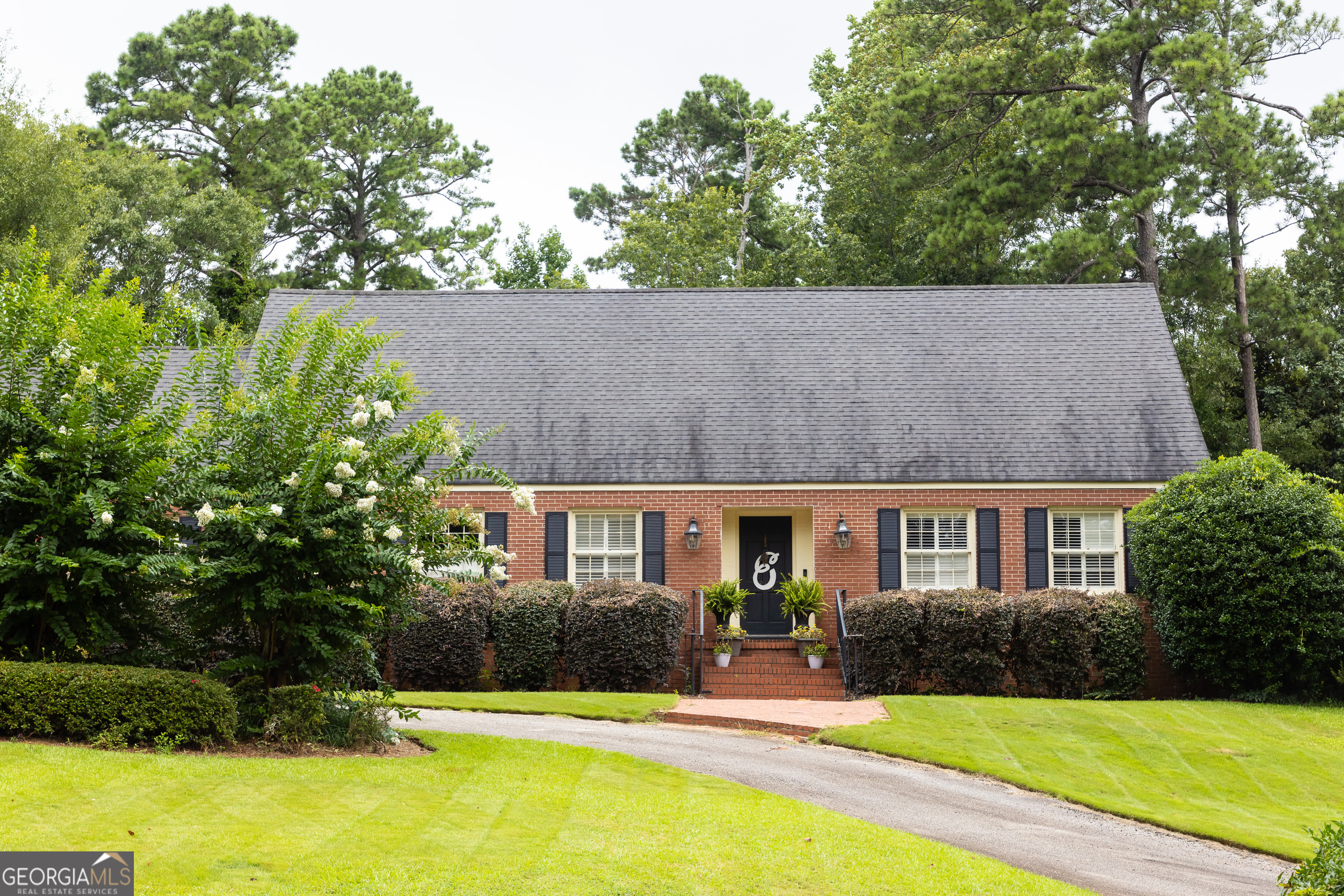 314 Cherokee Road Thomaston, GA 30286 - Photo 43 of 46 a house view with swimming pool and garden