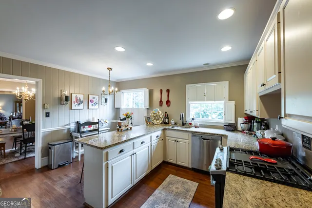 a kitchen with lots of counter space and a sink