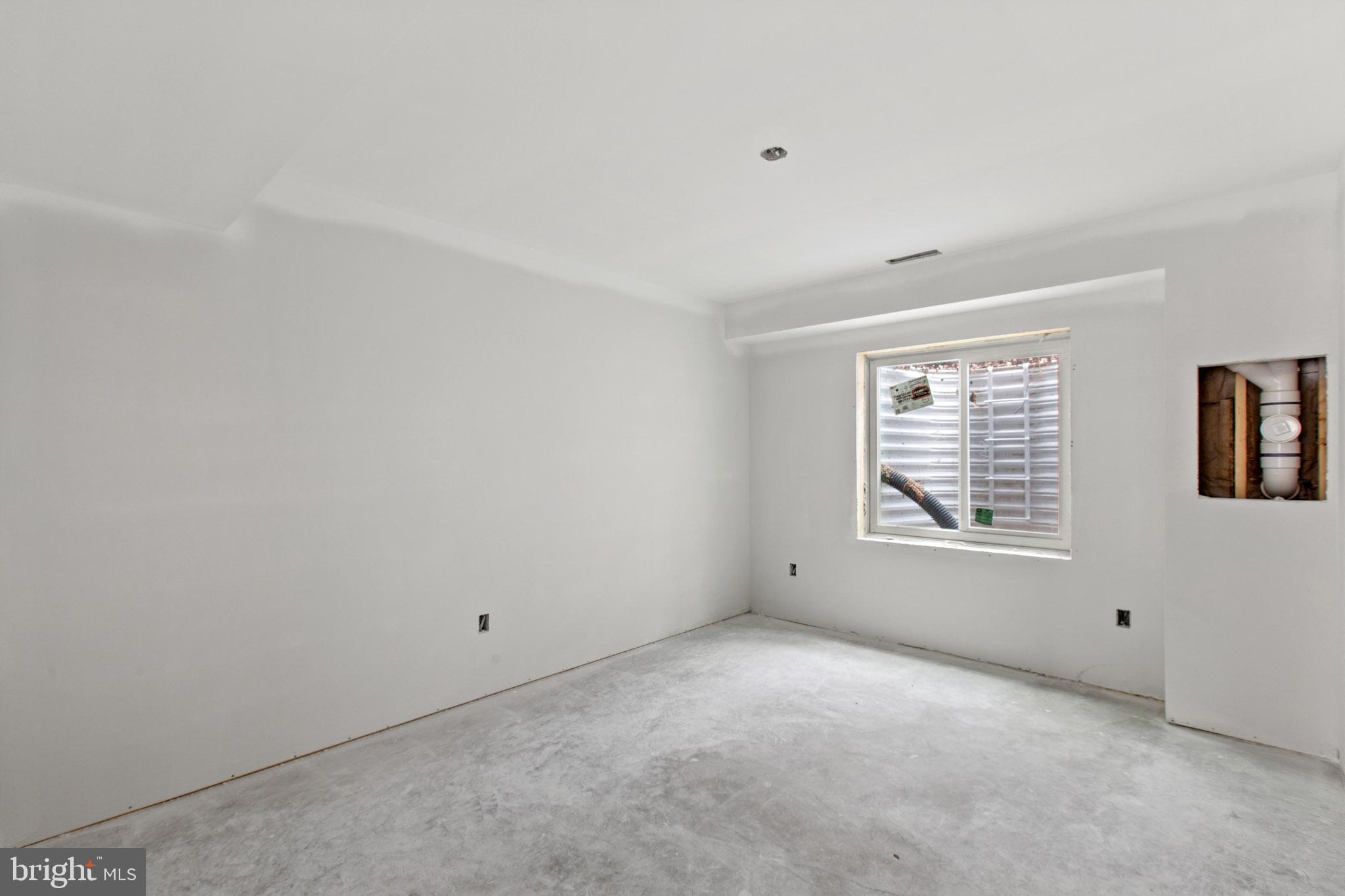 23570 Myrtle Point Road California, MD 20619 - Photo 12 of 18 a view of an empty room with a window