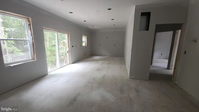 an empty room with windows