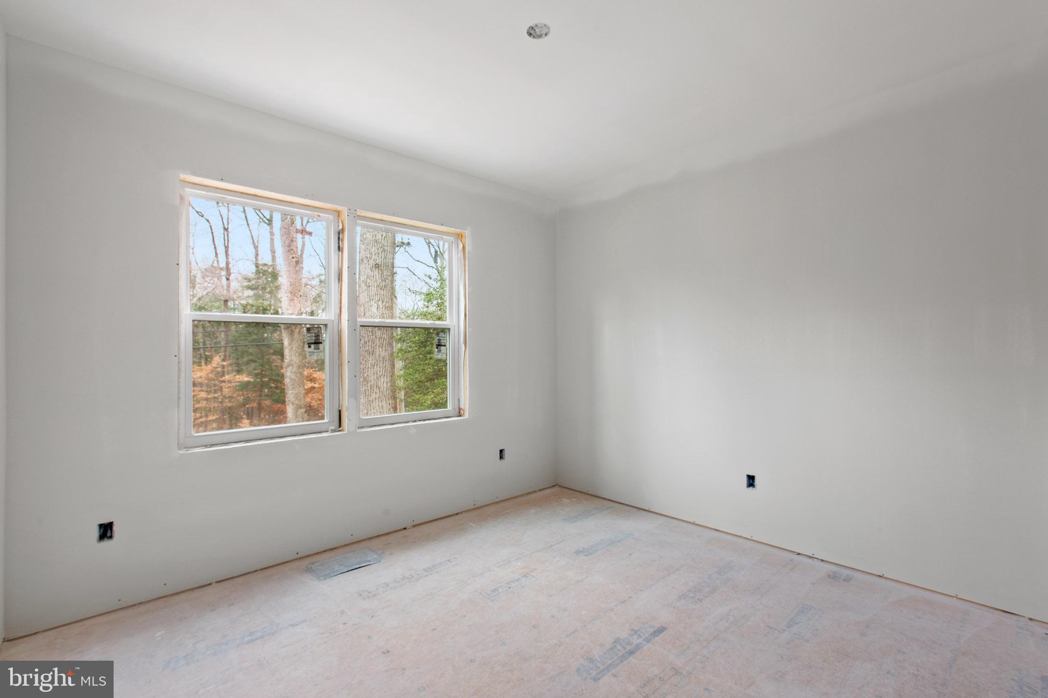 23570 Myrtle Point Road California, MD 20619 - Photo 5 of 18 a view of an empty room with a window