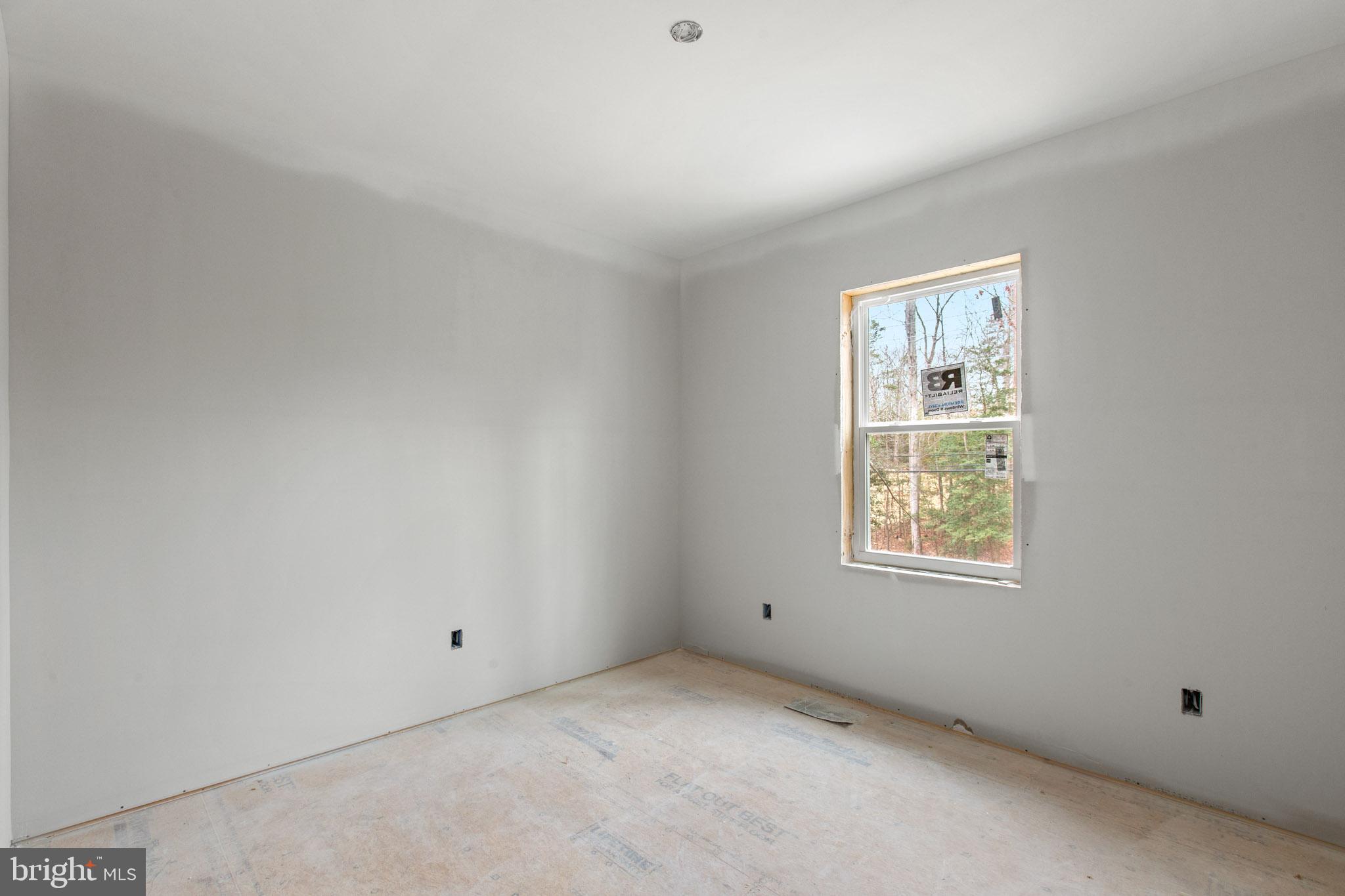23570 Myrtle Point Road California, MD 20619 - Photo 8 of 18 an empty room with windows