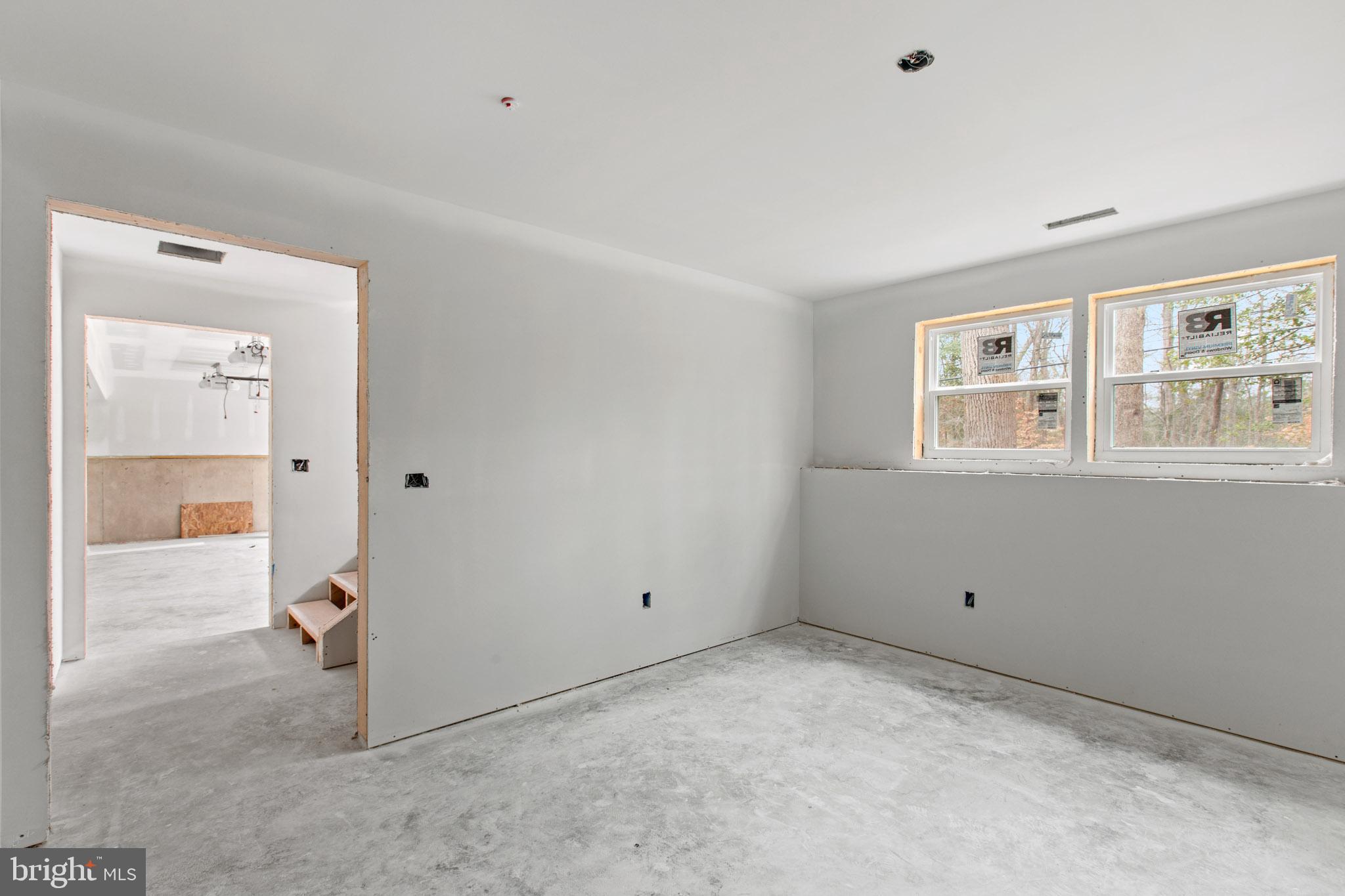 23570 Myrtle Point Road California, MD 20619 - Photo 10 of 18 a view of empty room with windows