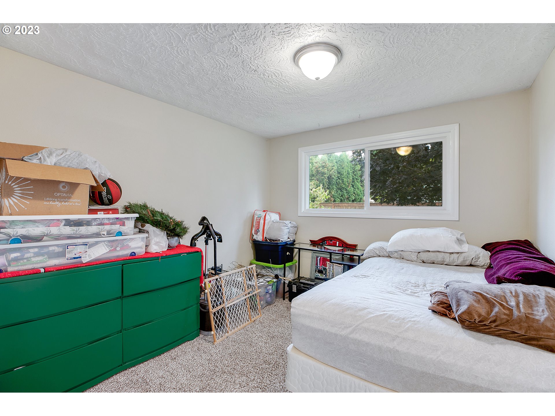 1802 Northwest 105th Street Vancouver, WA 98685 - Photo 19 of 23 a bedroom with two beds and a window