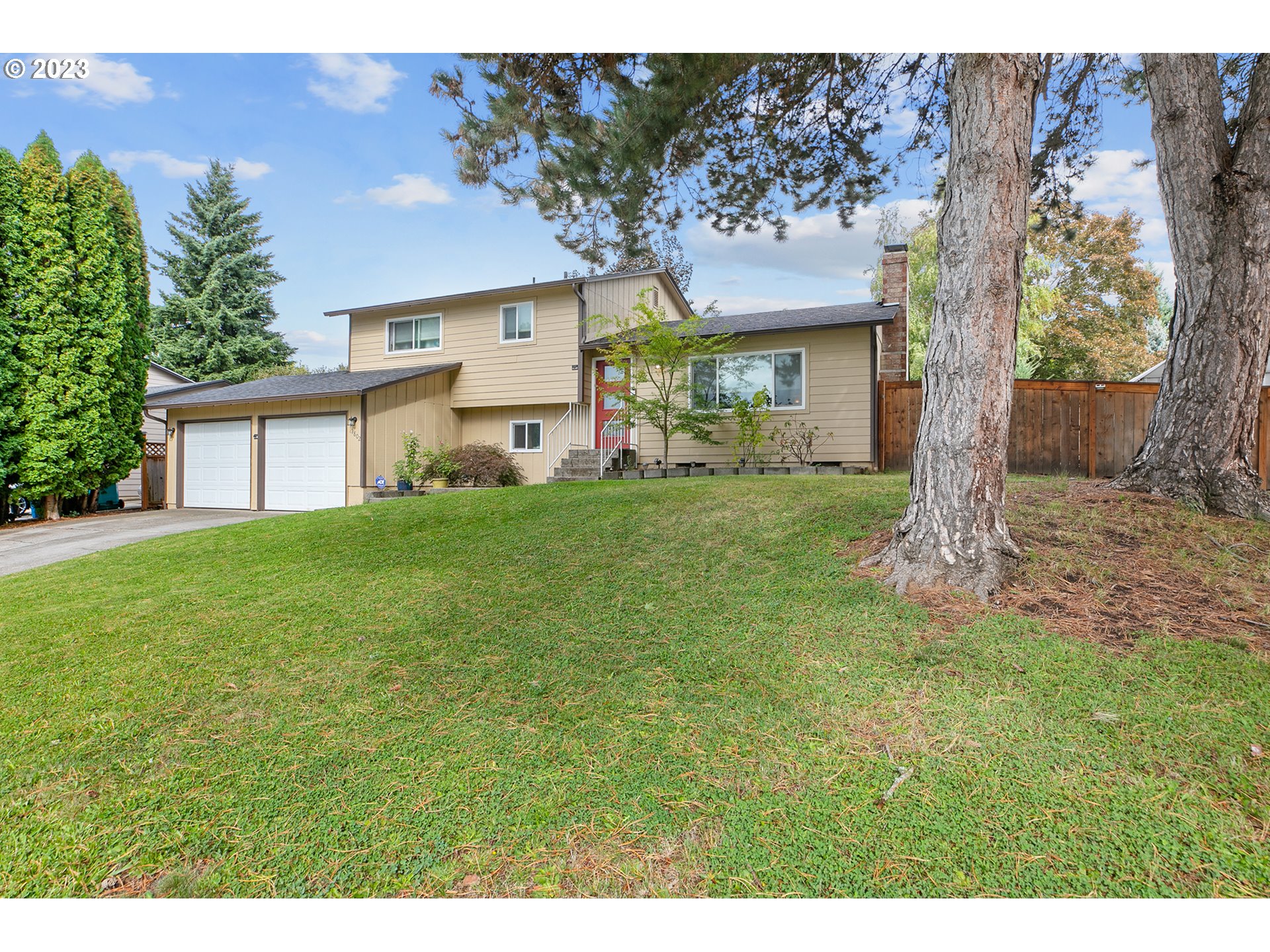 1802 Northwest 105th Street Vancouver, WA 98685 - Photo 2 of 23 a view of a house with a yard