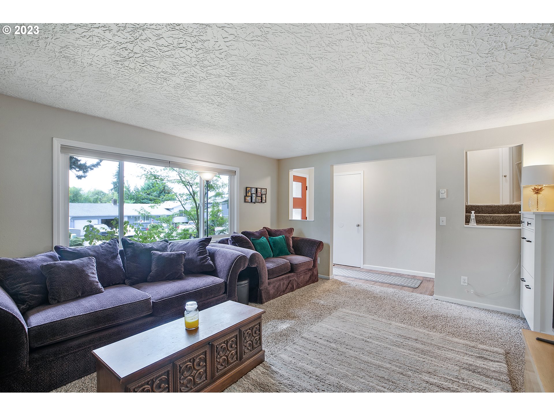 1802 Northwest 105th Street Vancouver, WA 98685 - Photo 6 of 23 a living room with furniture and a window