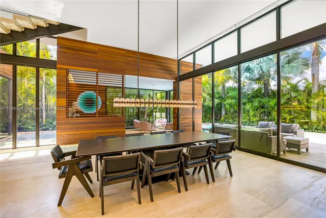 a spacious bedroom with a bed and wooden floor