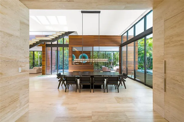 a bathroom with a tub and a painting on the wall