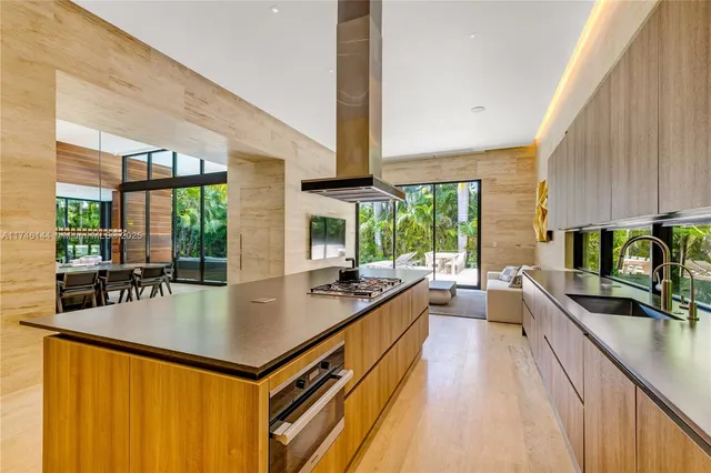 a view of balcony with wooden floor and fence