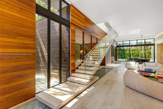 a view of house with green space