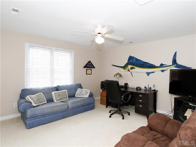 2021 Carrbridge Way Raleigh, NC 27615 - Photo 22 of 25 SPACIOUS BONUS ROOM WITH FOUR CLOSETS! COULD BE A FOURTH BEDROOM. PLENTY OF STORAGE FOR GAMES AND MOVIES! NOTE DOUBLE WINDOWS AND CEILING FAN + TWO ADDITIONAL DORMERS. THERE IS EVEN AN AREA DONE IN MAGNETIC PAINT SO THE KIDS CAN DISPLAY THEIR ARTWORK. Bonus Room
