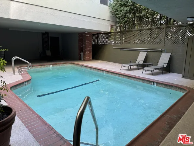 a backyard of a house with seating space