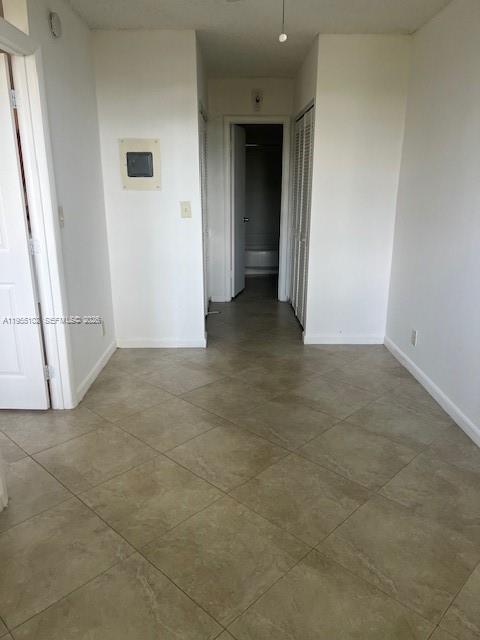 2401 Riverside Drive, Unit 110B Coral Springs, FL 33065 - Photo 12 of 27 an empty room with a natural light